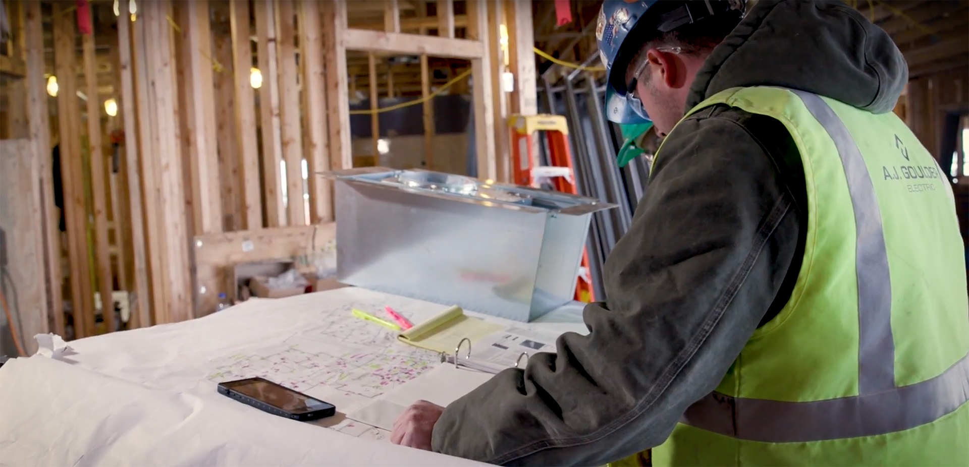 Image of electrical worker planning