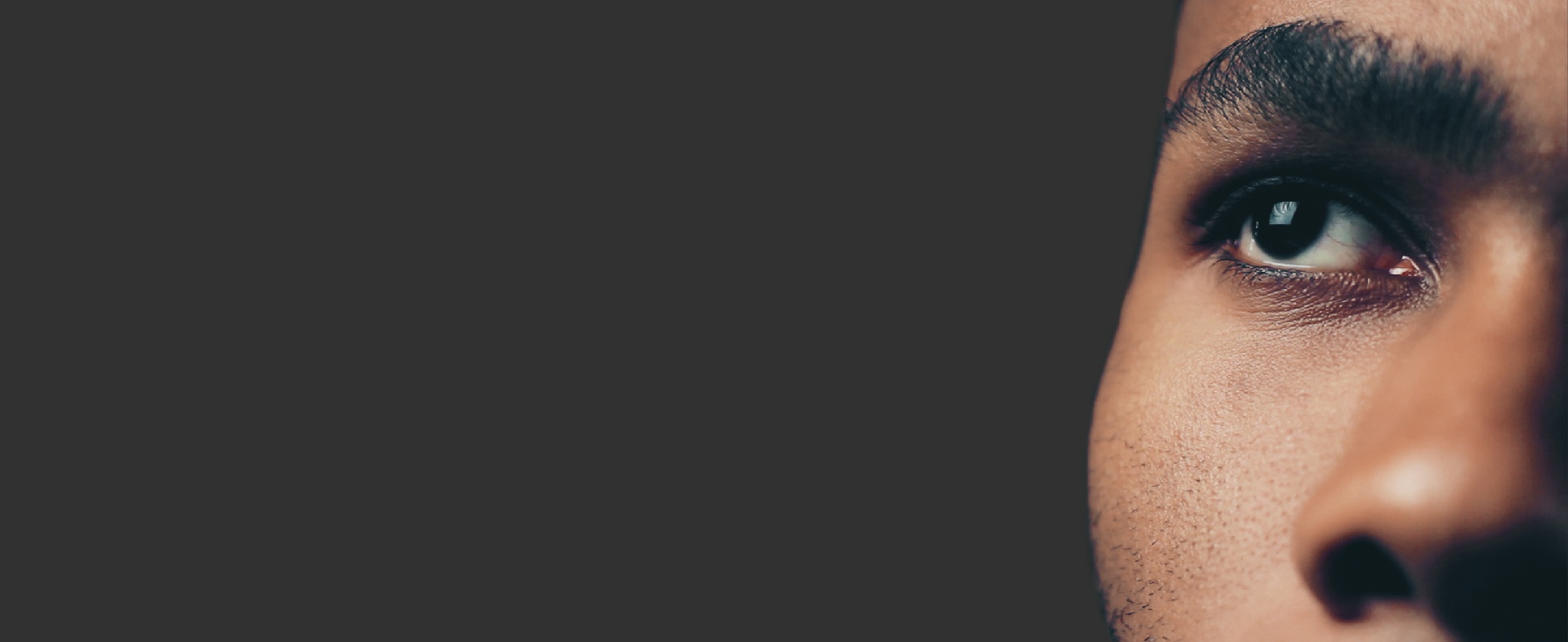 Image of individual looking up contemplating — our target audience